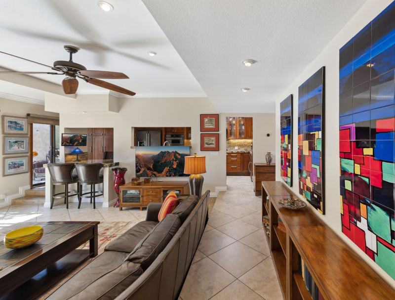 Living room seating area with ceiling fan