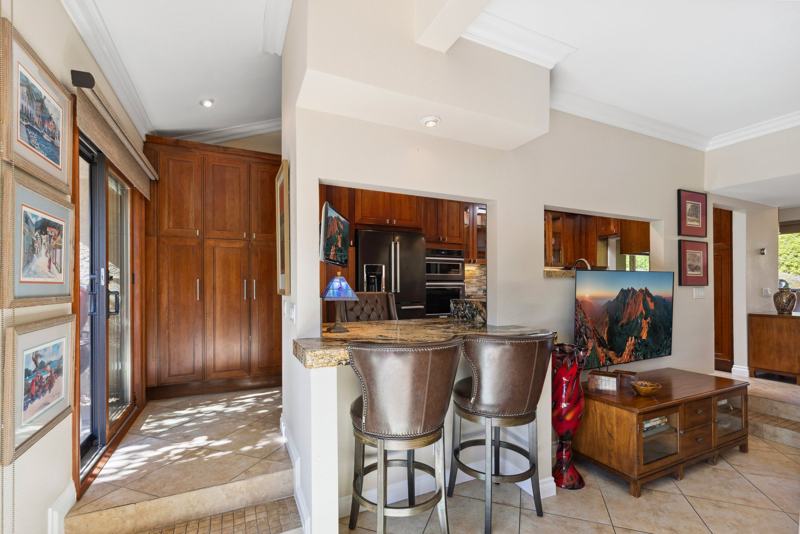 Formal dining room with cocktail bar seating