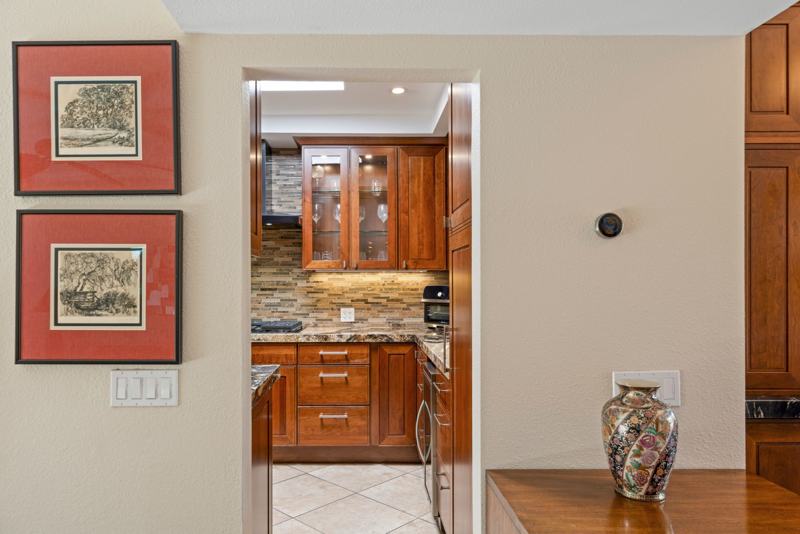 Kitchen and dining area with artwork