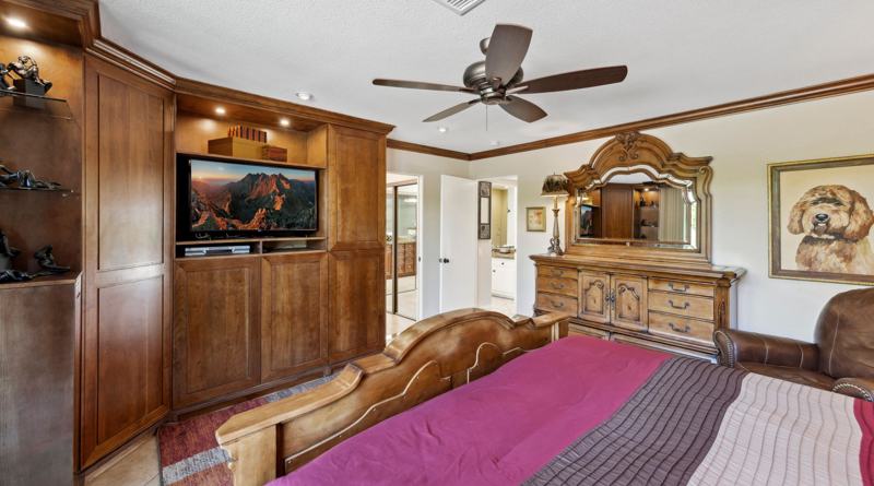 Primary king bedroom suite with entertainment center, Midtown Palm Springs rental