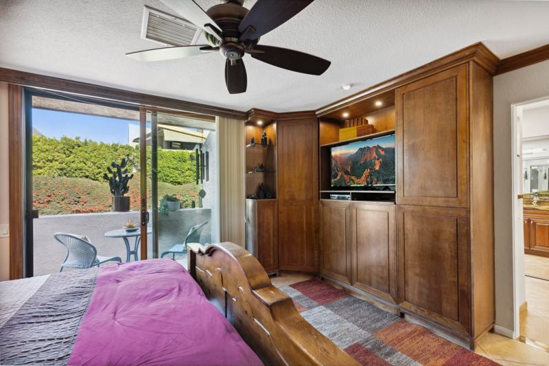 Primary king bedroom suite with patio access, Midtown Palm Springs rental