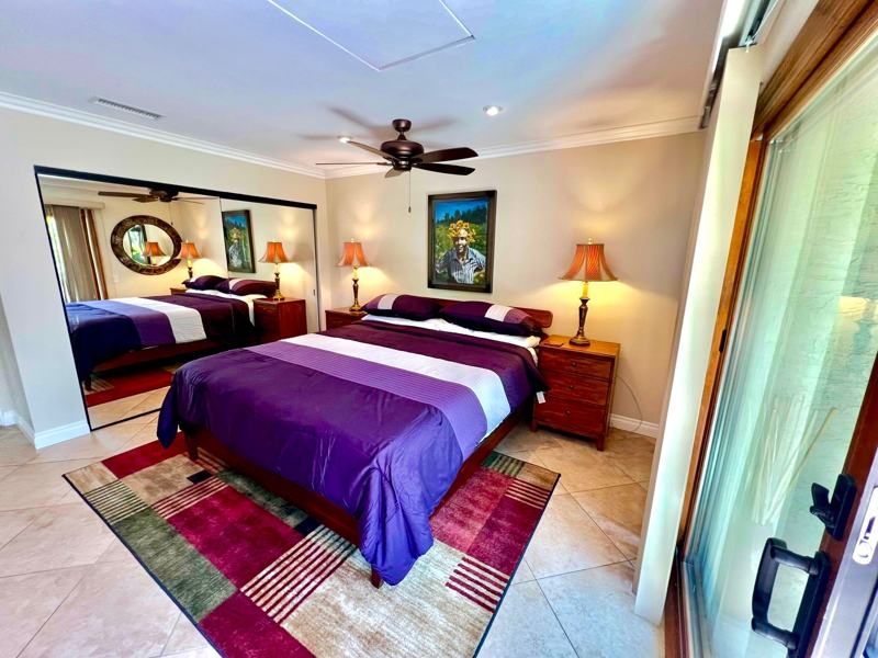 Guest king bedroom suite with private patio access