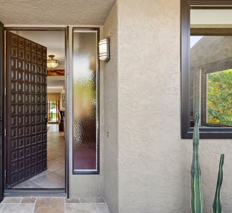 Main entry to Palm Springs Midtown Oasis in landscaped community