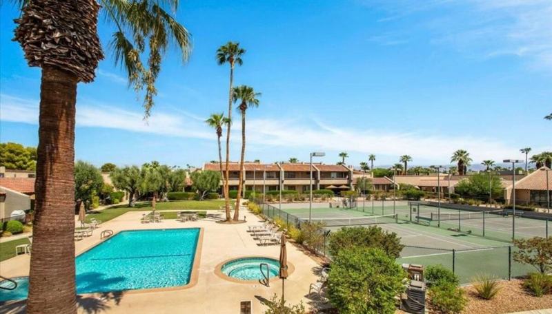Resort-style pool, spa, and tennis and pickleball courts at Palm Springs Midtown Oasis